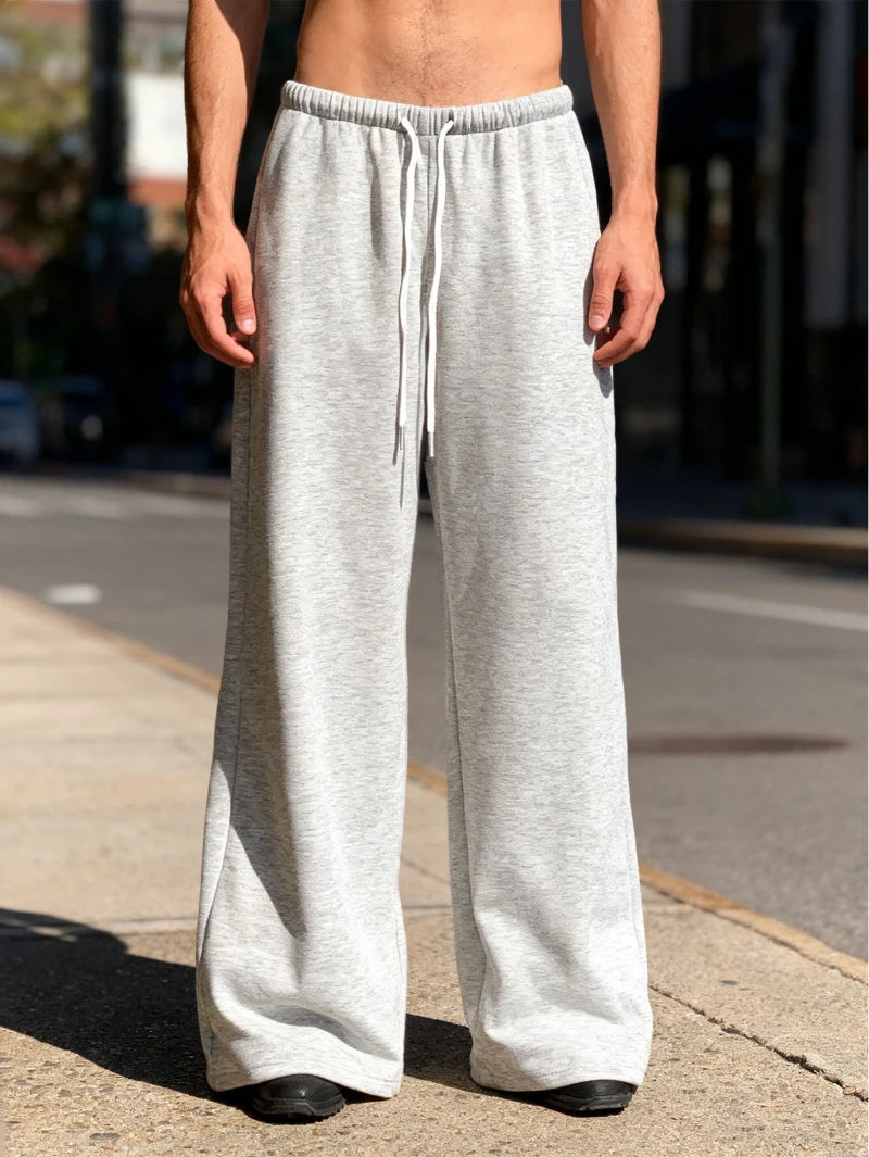Men's Casual Jogging Pants - Straight-leg, loose fit loungewear pants solid coloelastic waistband and drawstring design