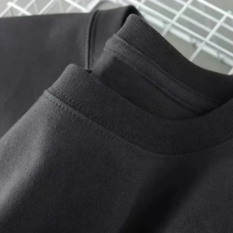 Cotton short-sleeved T-shirts and round-neck tops for men and women in autumn and winter are fashionable and casual
