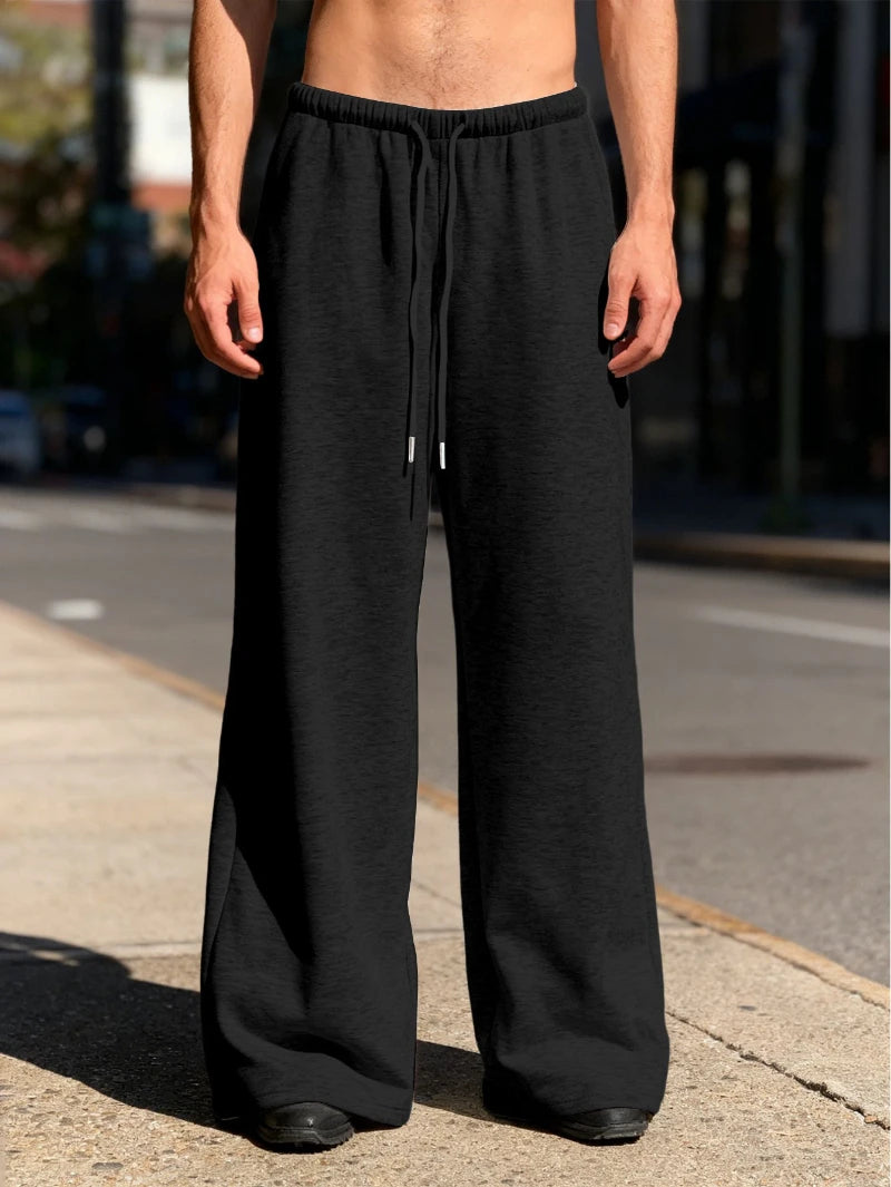 Men's Casual Jogging Pants - Straight-leg, loose fit loungewear pants solid coloelastic waistband and drawstring design